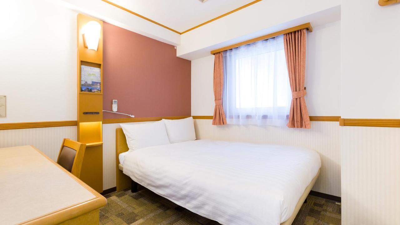 Toyoko Inn Tokyo Shinagawa-Eki Takanawa-Guchi Exterior foto