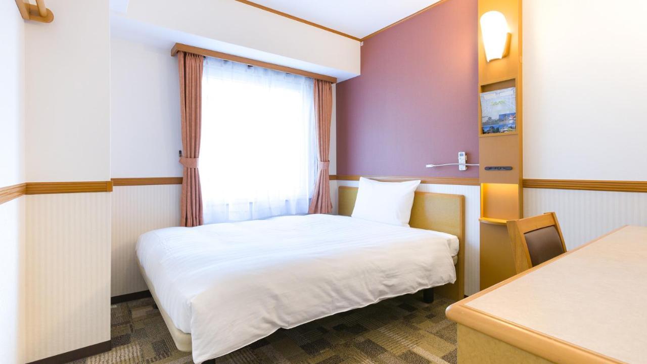 Toyoko Inn Tokyo Shinagawa-Eki Takanawa-Guchi Exterior foto